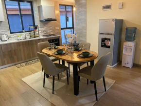 elegant retreat apartments with well equipped gym heated swimming pool ample parking space and relaxing rooftop with scenic views